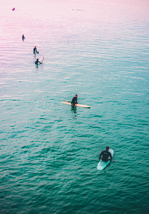 Surfers sitting