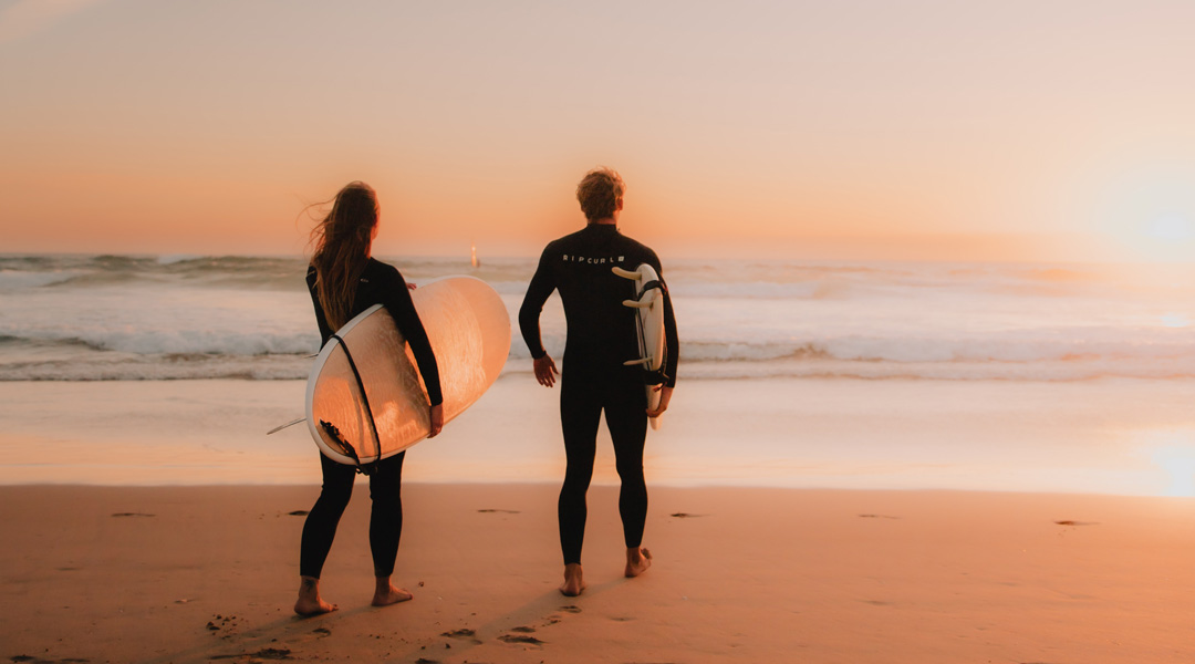 surfen zu zweit sicherheit wellenreiten