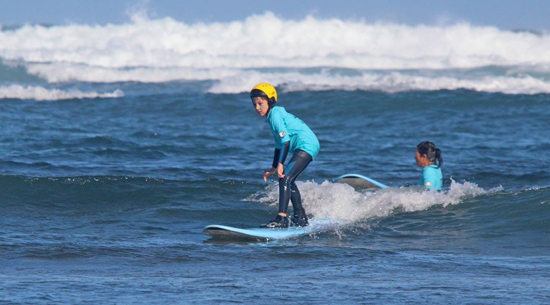 Kids surfing on Fuerteventura Kids surfing on Fuerteventura