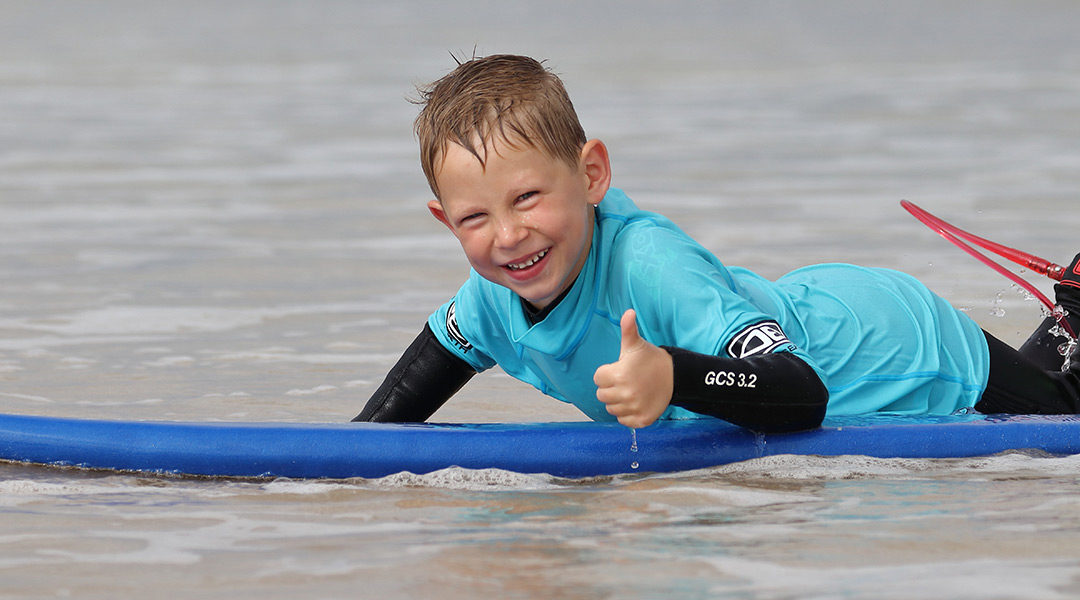 children-learning-to-surf children-learning-to-surf